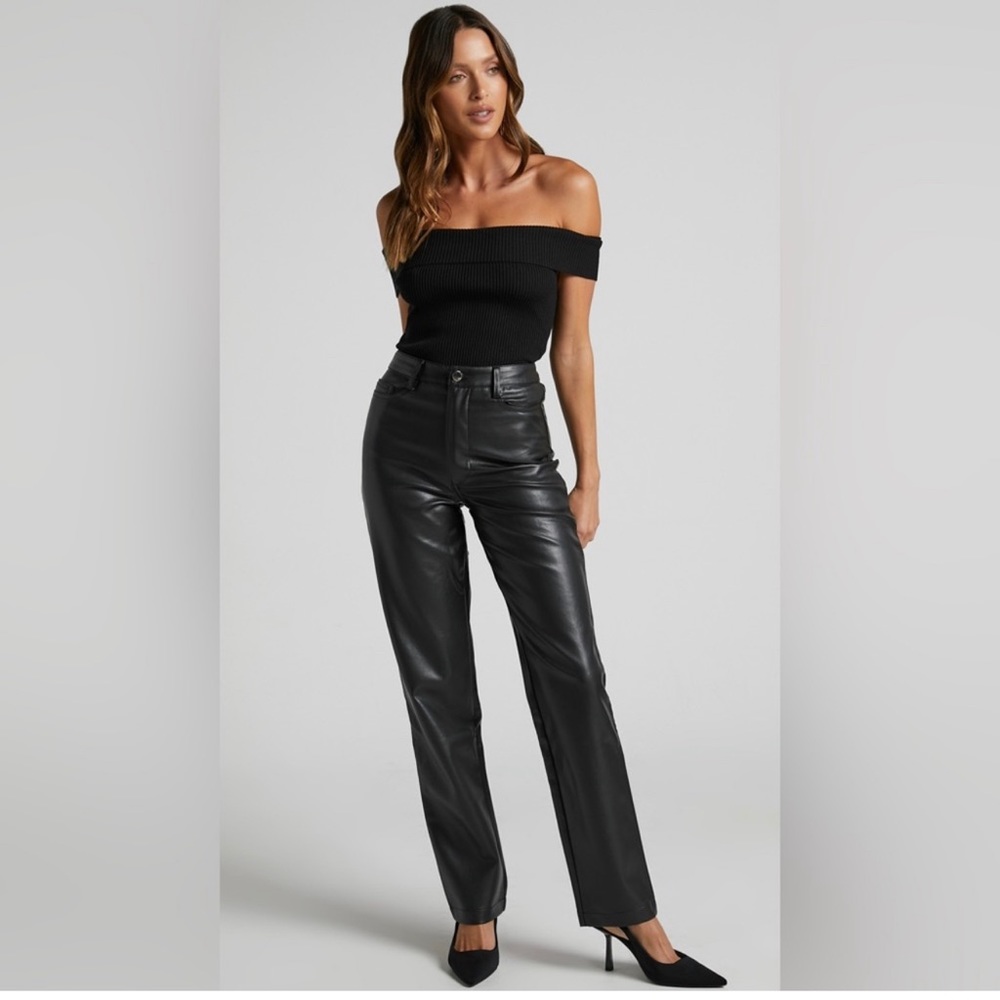 SHOWPO faux black leather mid rise pants.